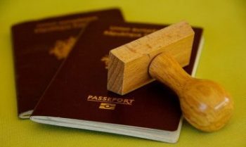 Two passports with a custom stamp