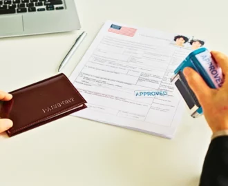 Close up of immigration office worker approving visa application. visa options for entrepreneurs